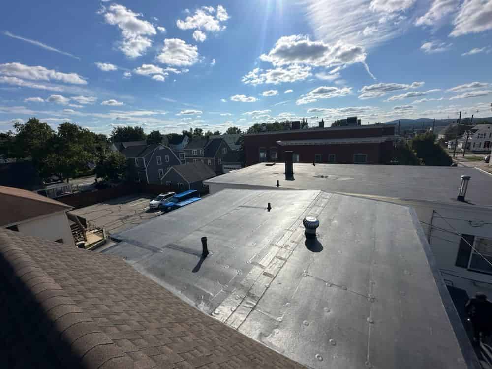 Shingle/Metal/Flat Roofing Services image